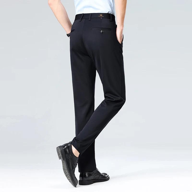 Pantalon d'affaires pour hommes en tissu très extensible adapté à toutes les saisons, doté d'une cei