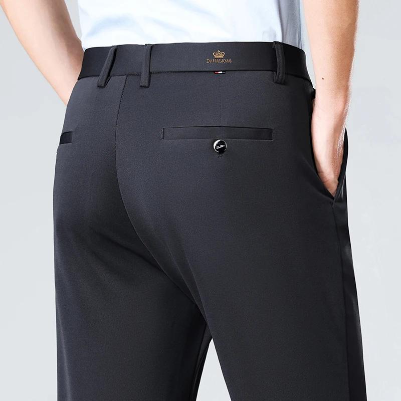 Pantalon d'affaires pour hommes en tissu très extensible adapté à toutes les saisons, doté d'une cei