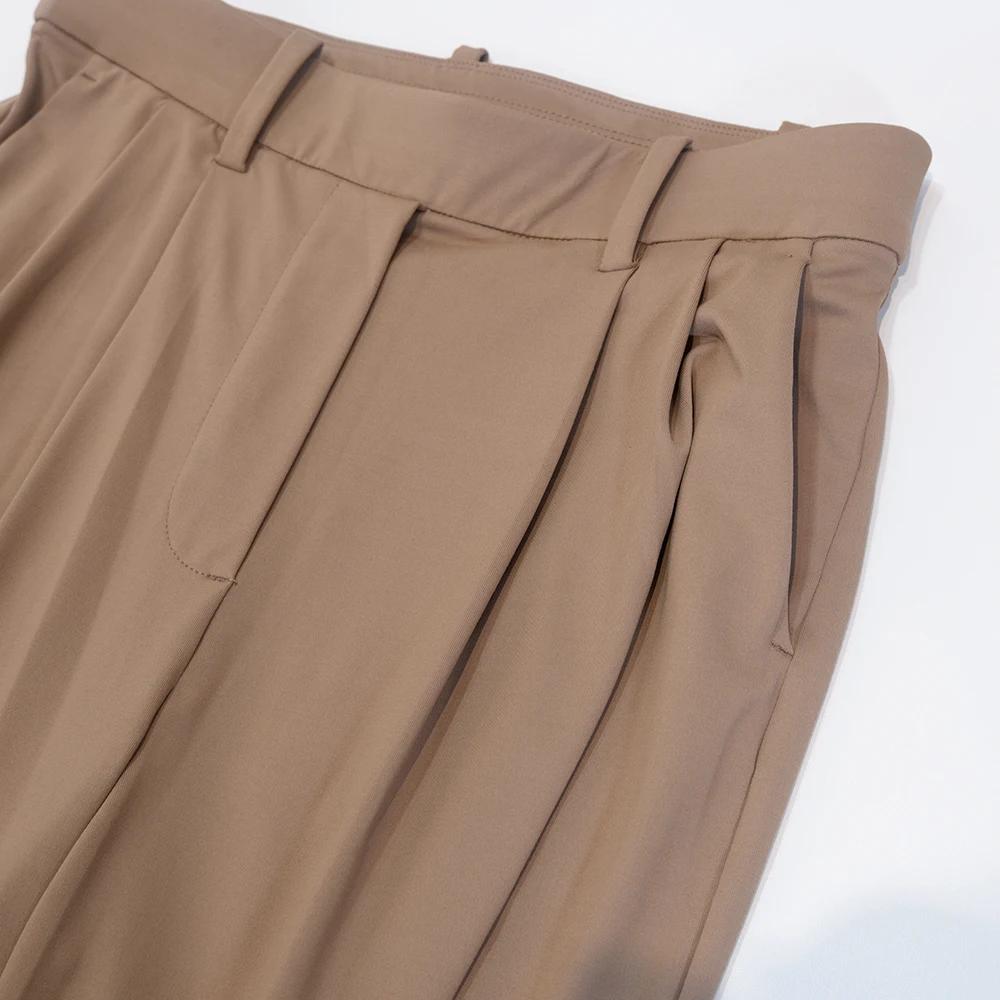 Pantalon de costume à poches avec plis